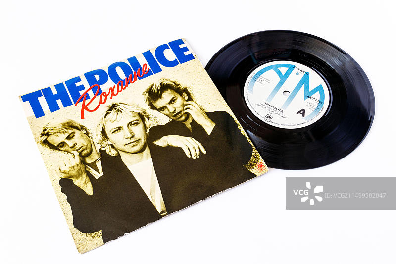 白色背景上，警察乐队《Roxanne》的7英寸45转单声道黑胶唱片，带原装封套图片素材