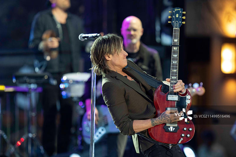 2023年3月29日，美国得克萨斯州奥斯汀：乡村音乐电视奖（CMT）录制期间，四次获得格莱美奖的乡村歌手凯斯·厄本在户外舞台上表演图片素材