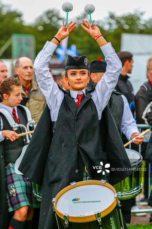 在格拉斯哥绿地举行的世界管乐队锦标赛决赛吸引了众多国际知名管乐队以及成千上万前来支持的游客和观众。苏格兰力量管乐队的鼓手图片素材
