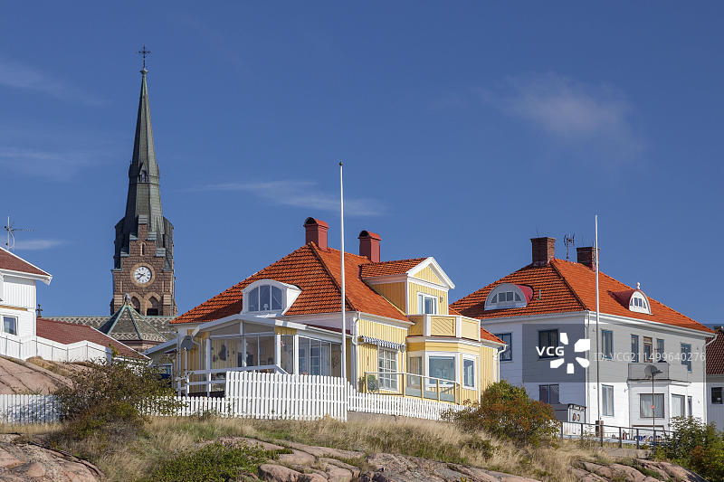 瑞典吕瑟希尔的房屋和教区教堂图片素材