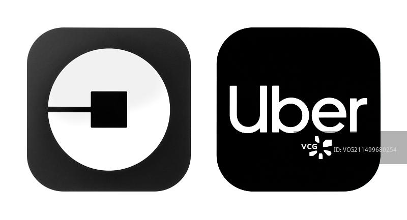乌克兰基辅：印刷在纸上的新旧款Uber图标。Uber是一家美国全球在线交通运输公司图片素材