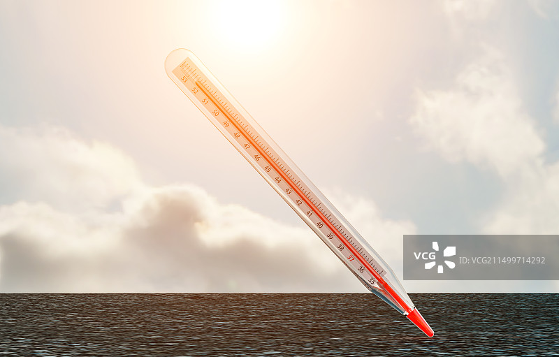 炎热酷暑沥青地面数值爆表的温度计图片素材