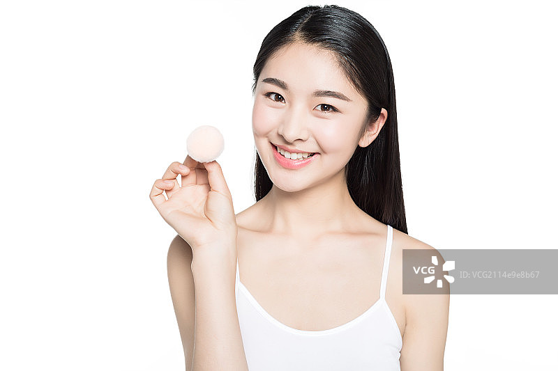 女孩拿着化妆工具图片素材