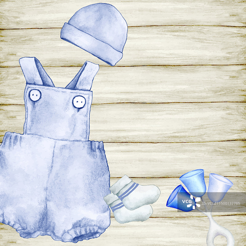 木桌上的婴儿服装图片素材