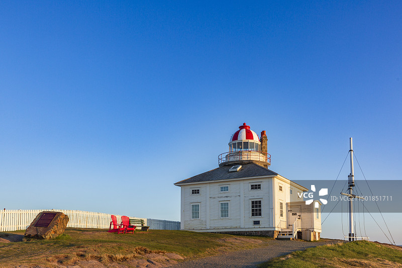 落日余晖中的加拿大国家历史遗址纽芬兰斯必尔海角灯塔博物馆图片素材