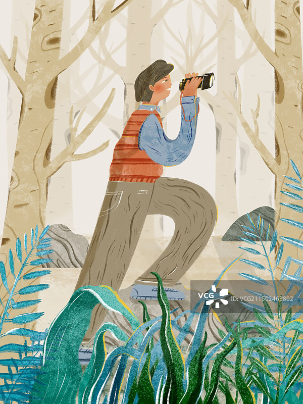 少年拿着望远镜在森林中探险图片素材