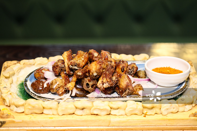 内蒙古美食石烹烤羊尾尖烤羊尾脊骨图片素材