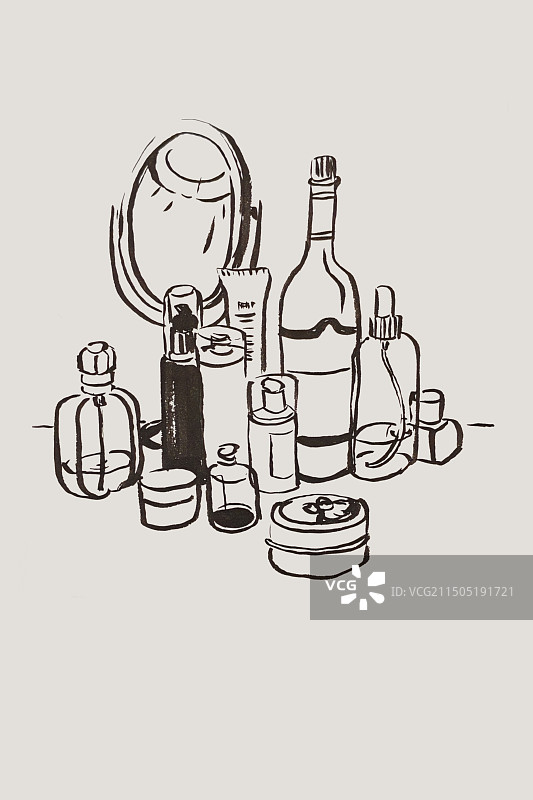 桌子上的化妆品与梳妆镜图片素材