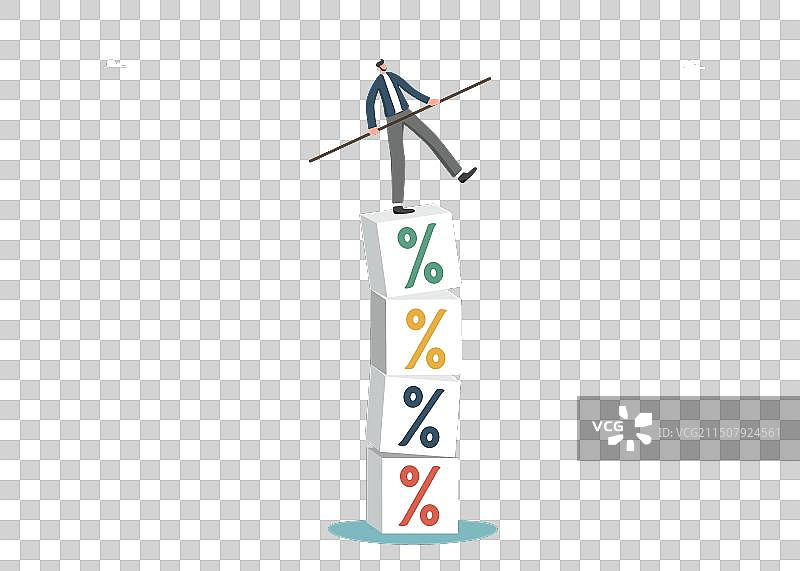 男人在利息方块上保持平衡图片素材