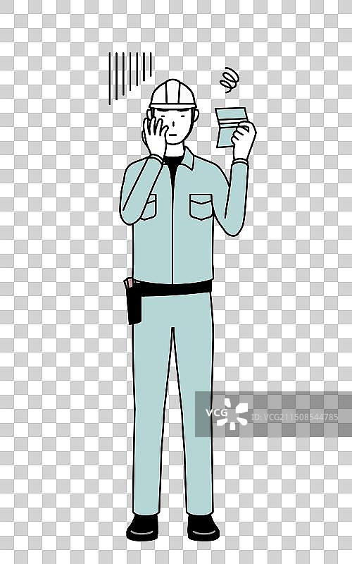 戴头盔穿工作服的男子查看图片素材