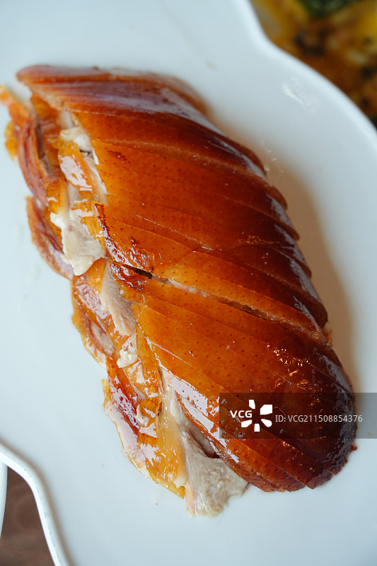 盘中的北京烤鸭特写，片皮鸭，鸭肉，非物质文化遗产，北京特产，地方特色美食，传统食品图片素材