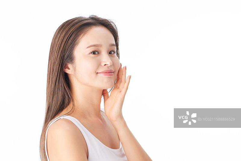 亚洲女人手托着脸图片素材