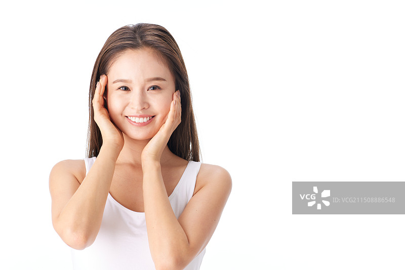 双手抚面的亚洲女人图片素材