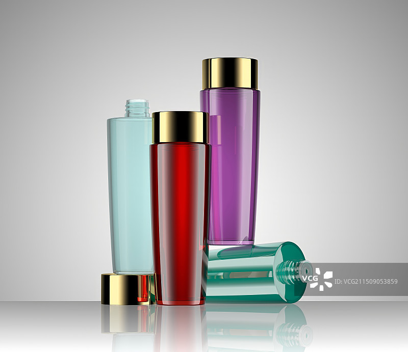 蓝色紫色玻璃爽肤水化妆品瓶子组合图片素材