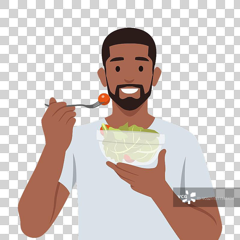 年轻男人吃沙拉，健康饮食图片素材