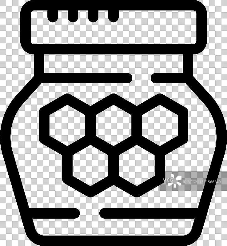 装满蜂蜜并露出蜂巢的玻璃罐图片素材