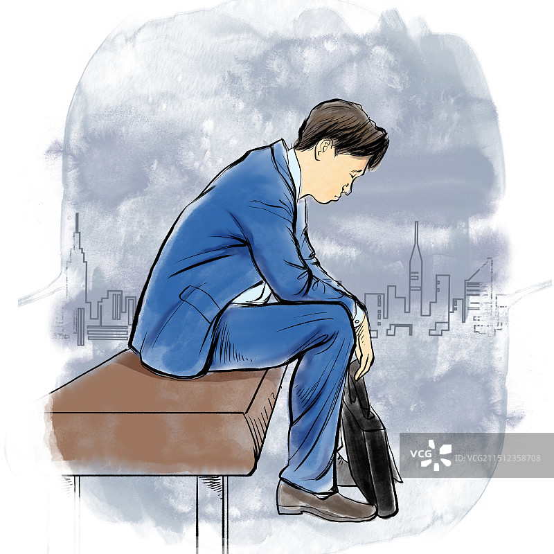 一个压力很大的失业者孤独的坐在长椅上图片素材