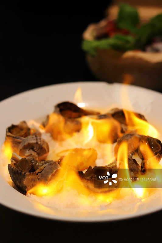 盐焗海螺图片素材