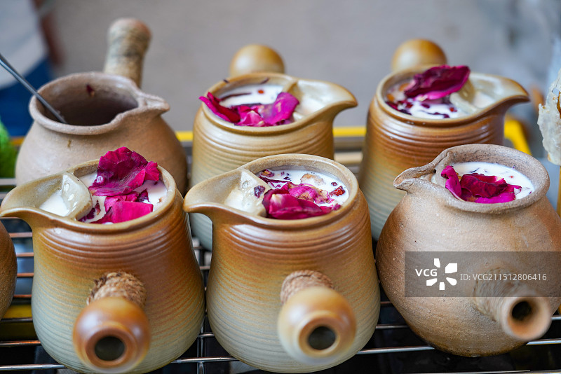 云南小吃罐罐烤奶图片素材