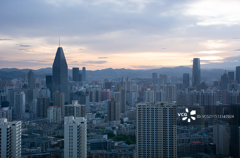 甘肃兰州城关区繁华城市中心摩天大楼早晨日出朝霞风光图片素材