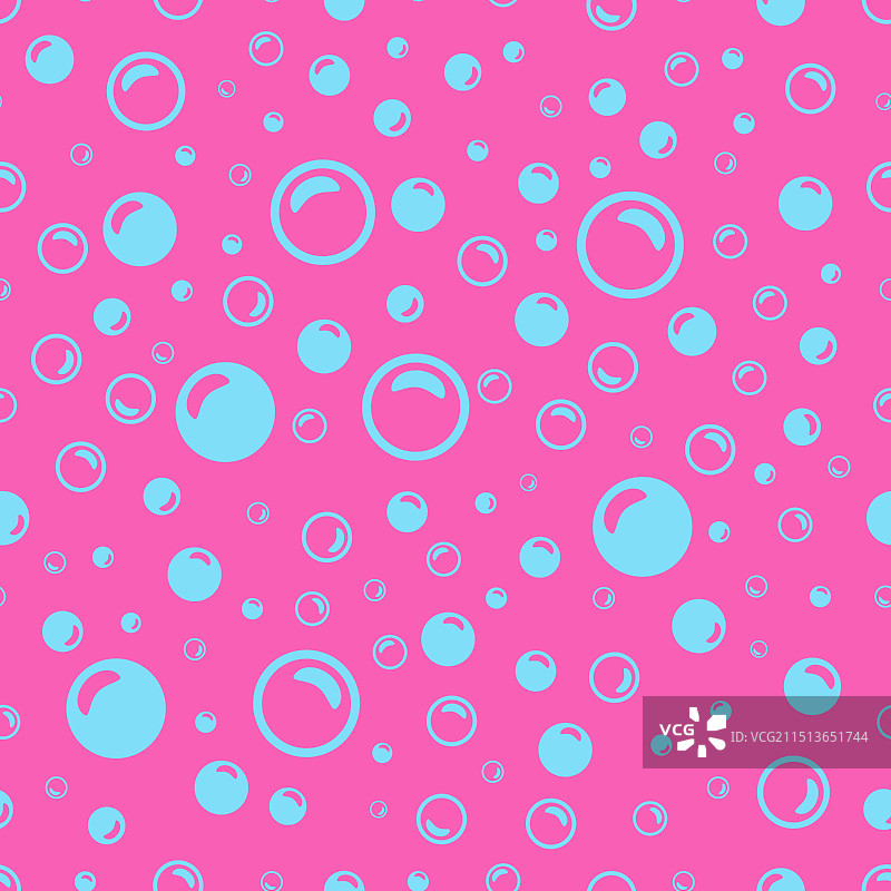 粉色背景上的浅蓝色肥皂泡图片素材