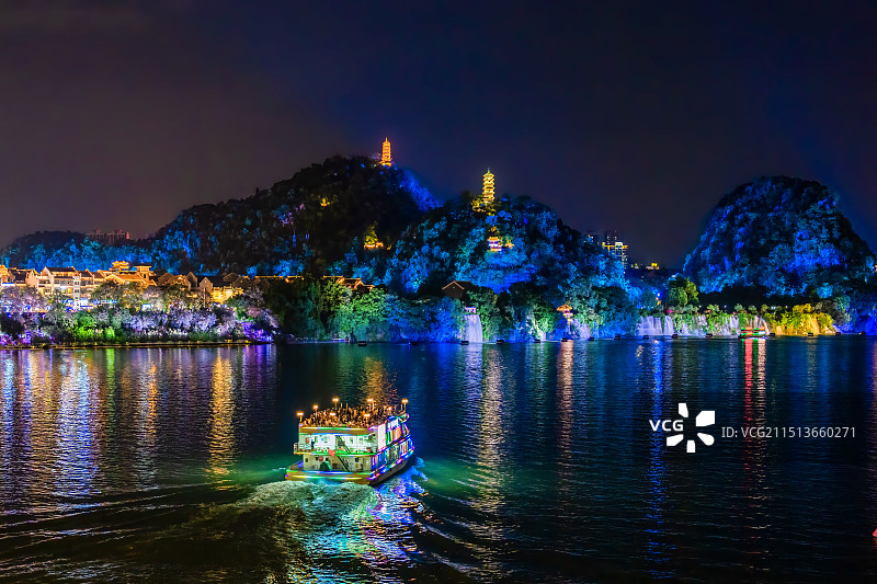 广西柳州柳江河游船、蟠龙山、蟠龙双塔与城市夜景风光图片素材