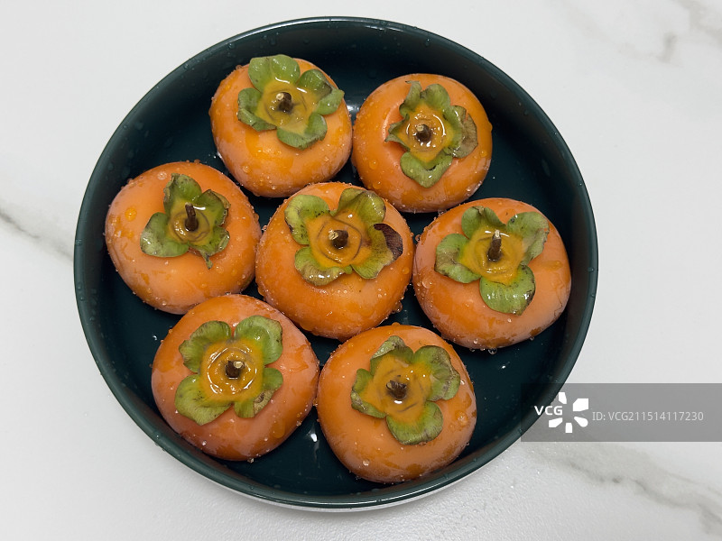 晶莹剔透的临潼火晶柿子图片素材