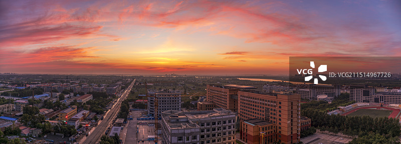 哈尔滨日出火烧云图片素材