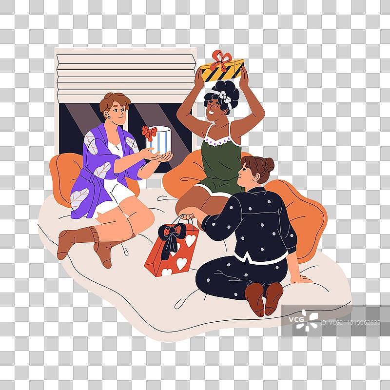 女孩之夜互换礼物的快乐年轻女人们图片素材