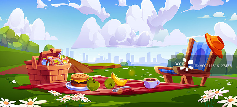 城市公园里的野餐场景，有毯子和篮子图片素材