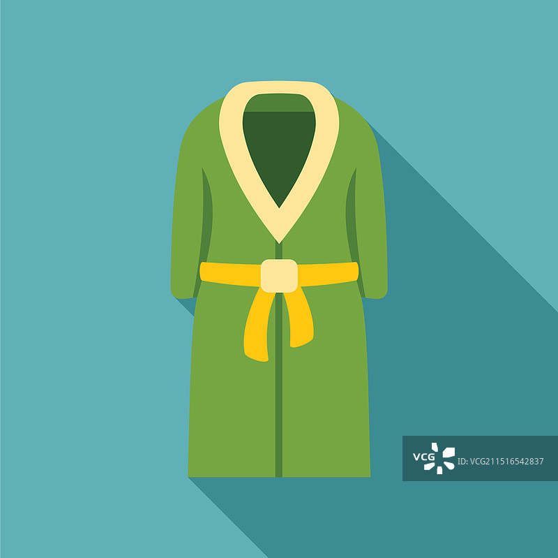 挂在墙上的带长阴影的绿色浴袍图片素材