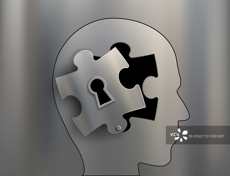 人头拼图上的钥匙孔图片素材