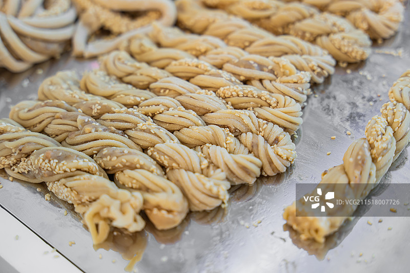 天津桂发祥十八街大麻花制作流程图片素材