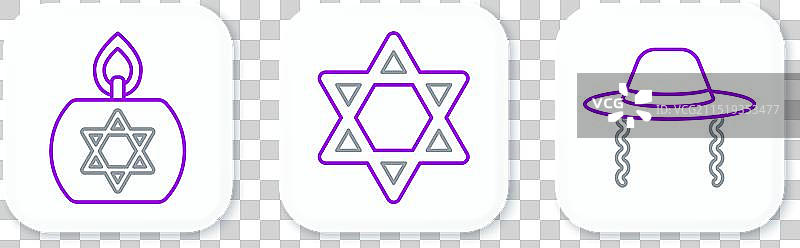 犹太帽子和燃烧的蜡烛图片素材