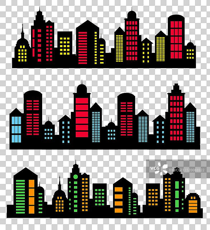 夜间发光窗户的城市轮廓图片素材