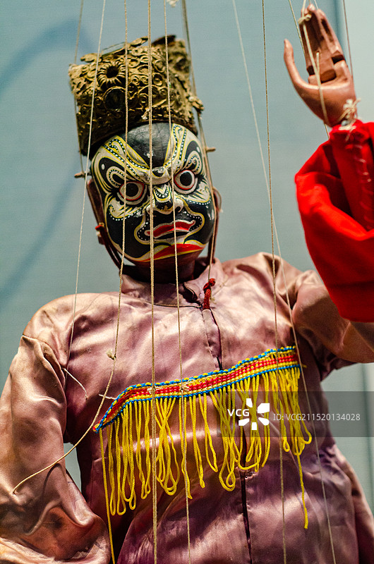 中国福建的非物质文化遗产，黑脸的悬丝傀儡图片素材