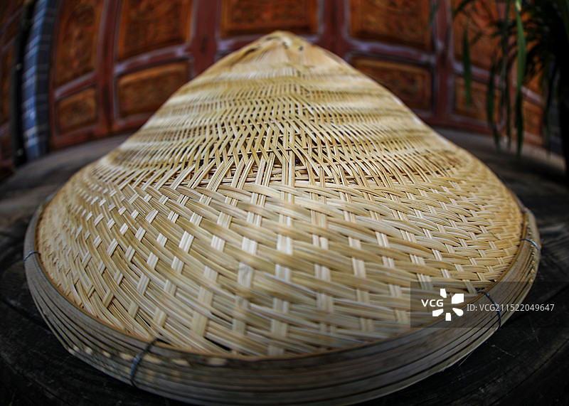 少数民族地区竹笠特写镜头图片素材