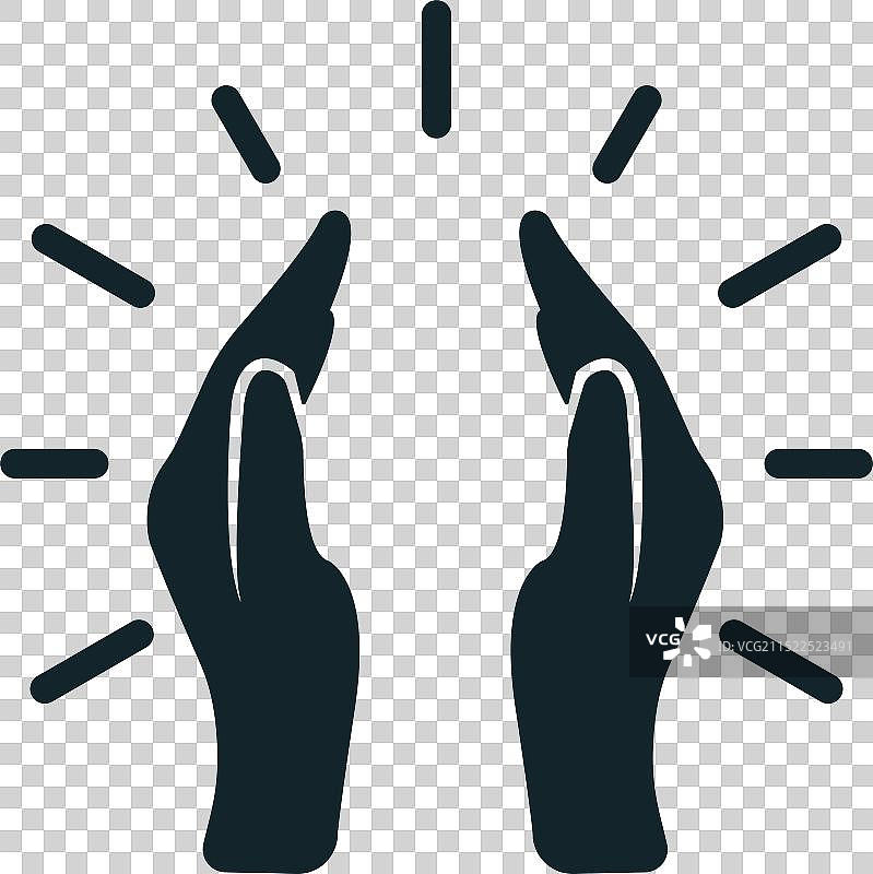 双手呵护着耀眼的光芒图片素材