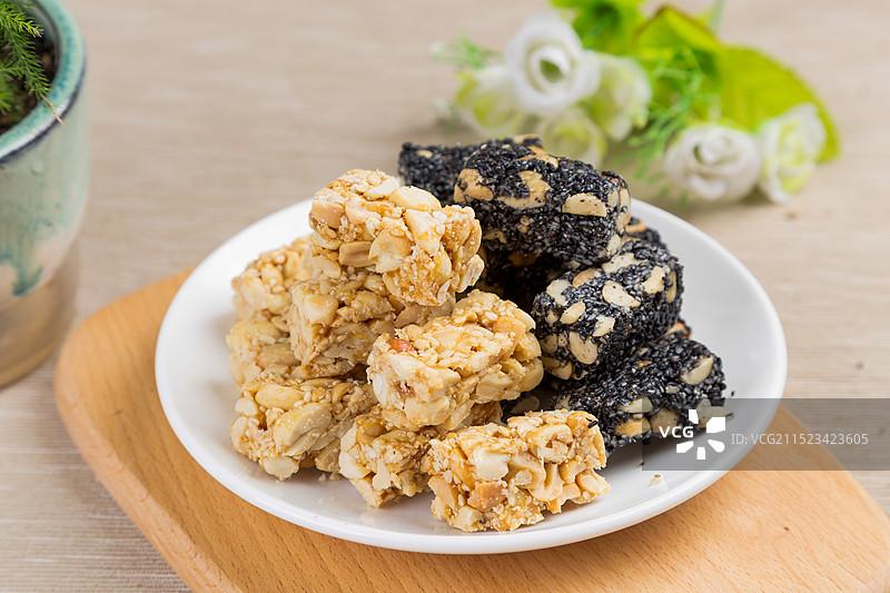 影棚拍摄芝麻花生酥糖糖果零食图片素材