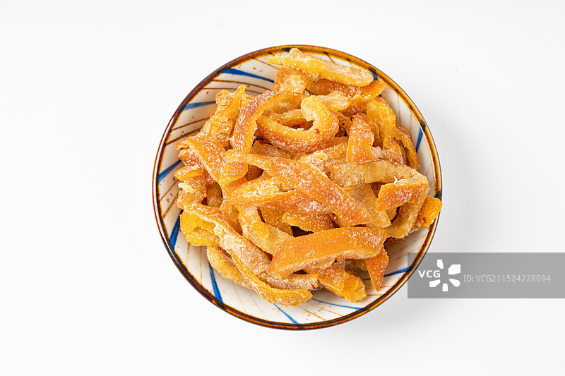 盘子里的小零食盐津陈皮干图片素材