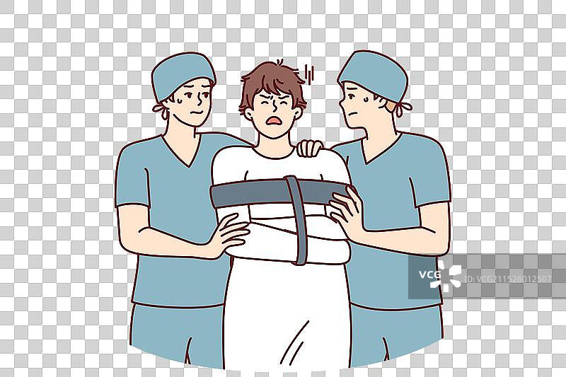 两名护理员带着穿紧身衣的男子图片素材