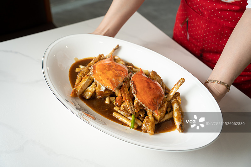 梭子蟹炒年糕图片素材