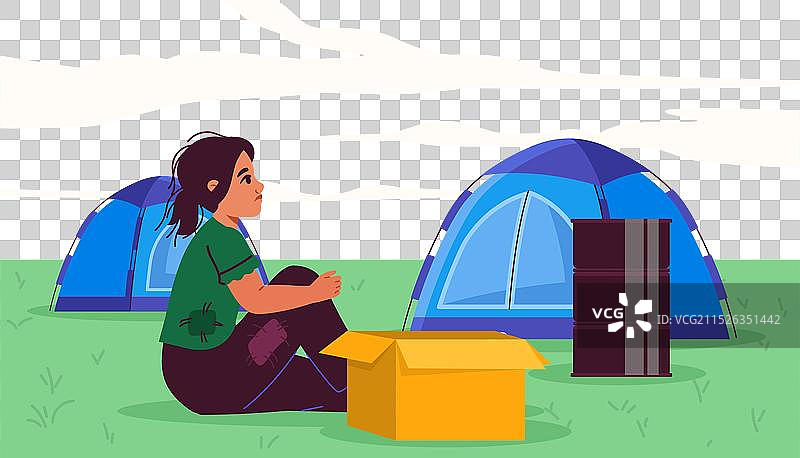 帐篷附近的贫困女孩坐在纸箱旁图片素材