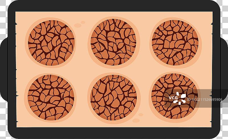 黑色烤盘上的卡通燕麦饼干图片素材