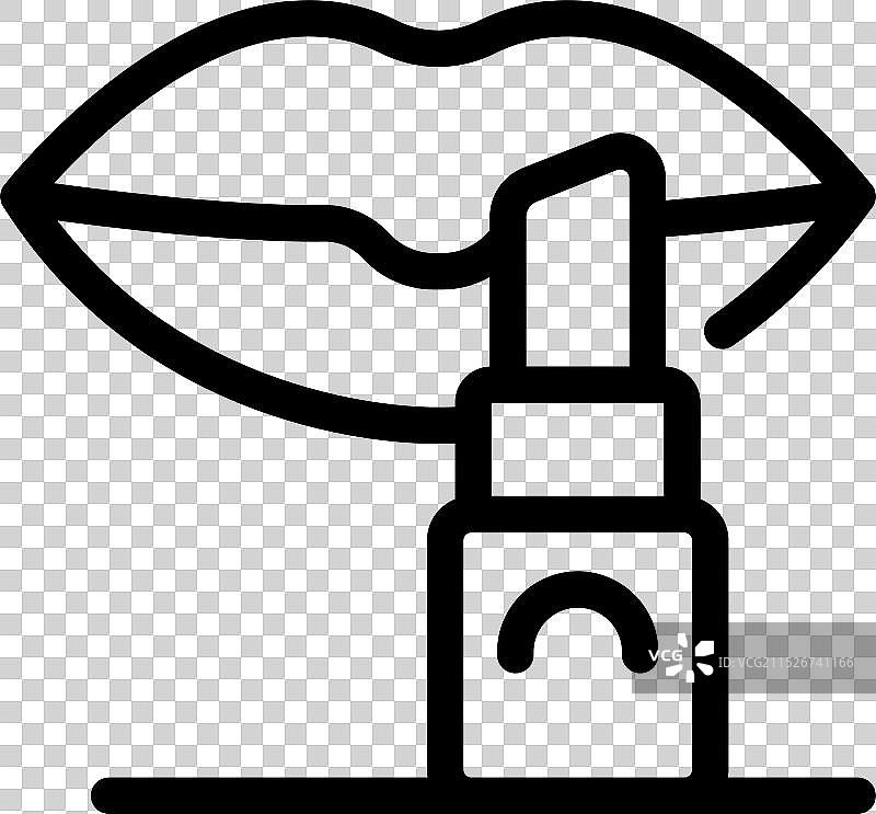 在女性嘴唇上涂口红图片素材