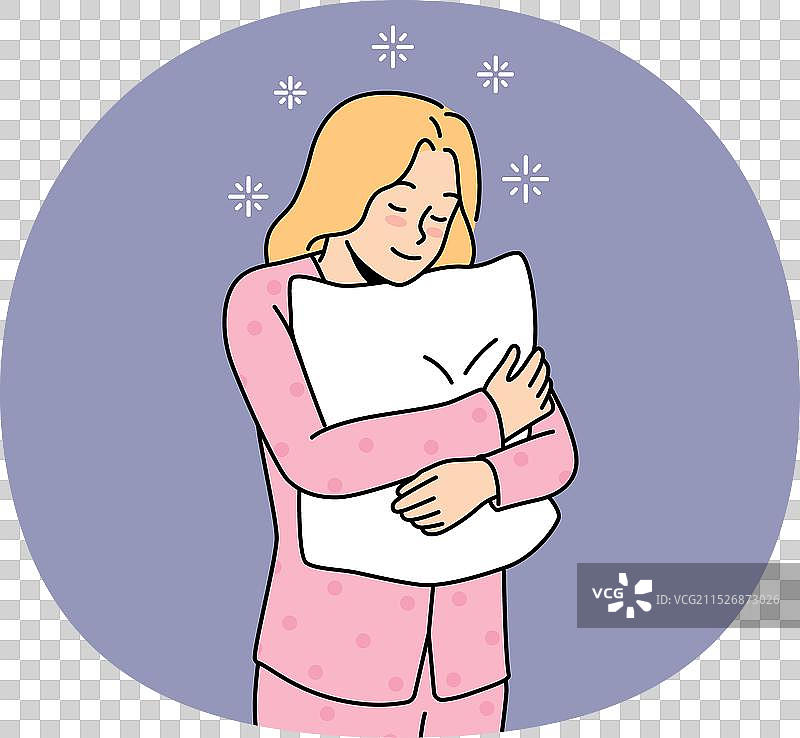 穿着睡衣抱着枕头的快乐女孩图片素材