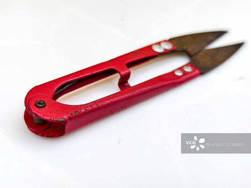 老式的红色的线头剪图片素材