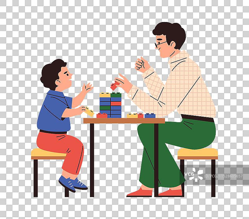 快乐的父亲和儿子一起玩乐高积木图片素材