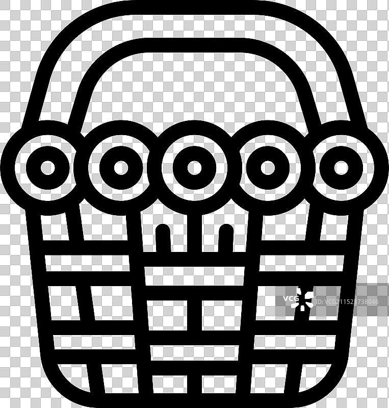 装满圆形棒棒糖的藤编篮子图片素材