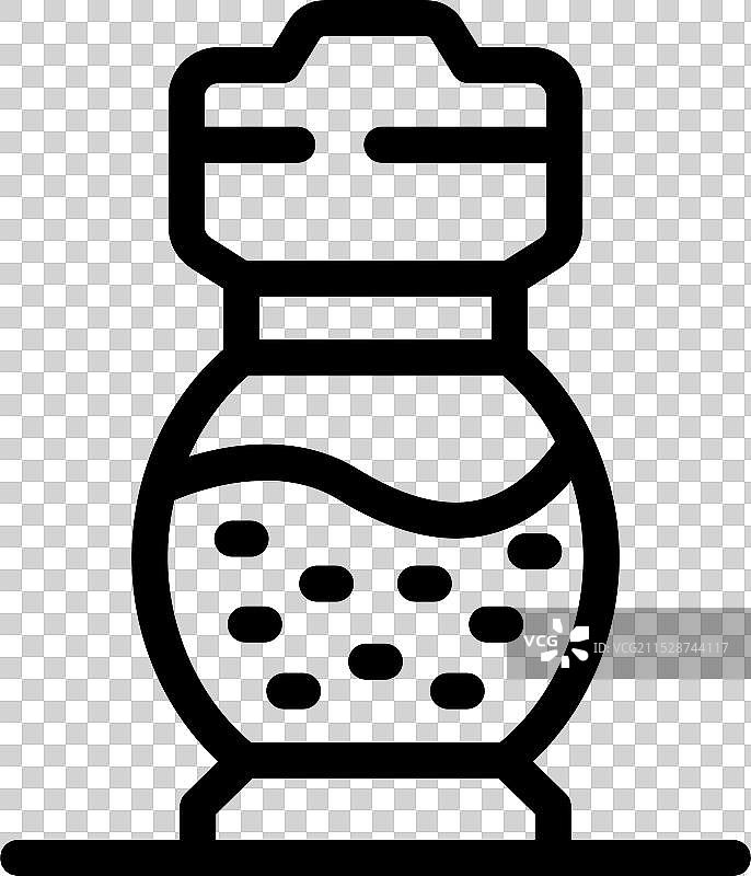 圆形玻璃胡椒瓶撒出黑胡椒粉图片素材